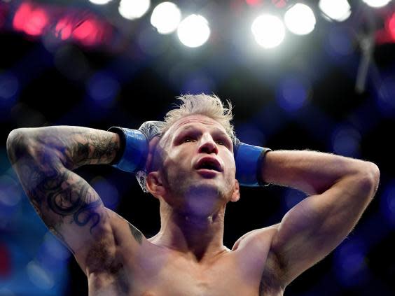 TJ Dillashaw has relinquished the UFC bantamweight title after failing a drugs test (Getty)