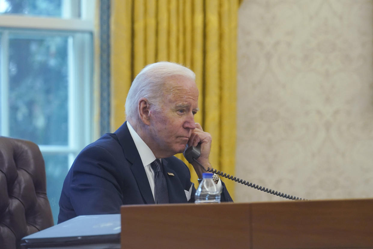 President Joe Biden speaks with Ukrainian President Volodymyr Zelenskyy from the Oval Office of the White House (Susan Walsh / AP file)