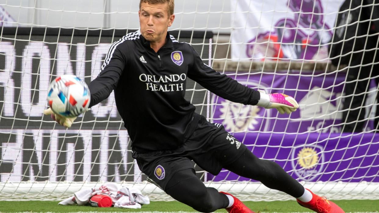 <div>ORLANDO, FL - AUGUST 12: Orlando City goalkeeper Mason Stajduhar (31) warms up before the Leagues Cup Quarterfinal match between Orlando City SC and Santos Laguna on August 12, 2021, at Exploria Stadium in Orlando, FL. (Photo by Joe Petro/Icon Sportswire via Getty Images)</div>