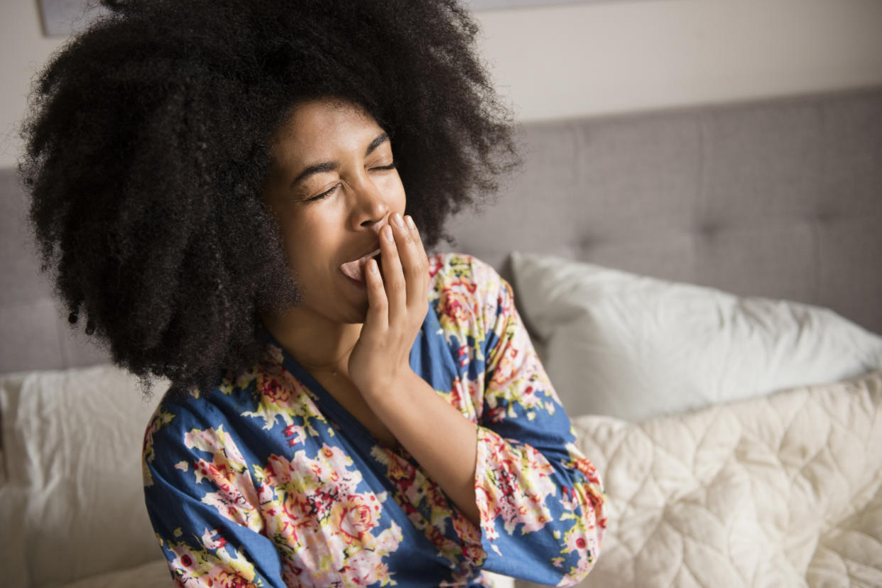 Stock picture of a woman looking tired. (Getty Images)