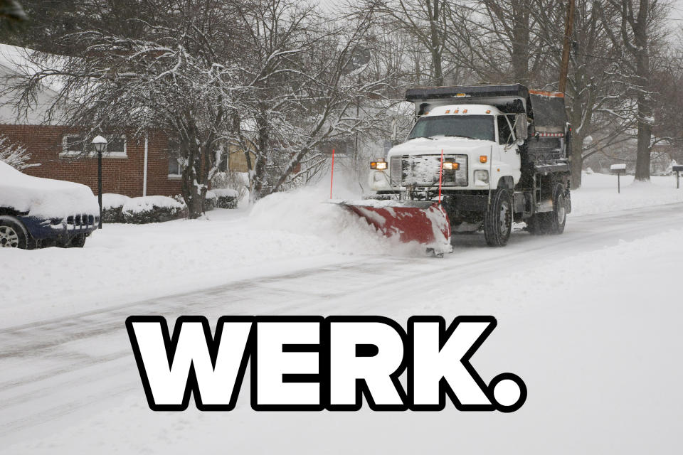 Snow truck plowing the road