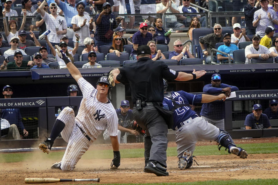 New York Yankees' DJ LeMahieu is ruled safe at home plate for a score in the sixth inning of a baseball game against Tampa Bay Rays, Saturday, May 13, 2023, in New York. (AP Photo/Bebeto Matthews)