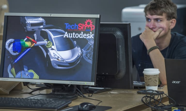 A member of TechShop works on a design computer, in Arlington, Virginia