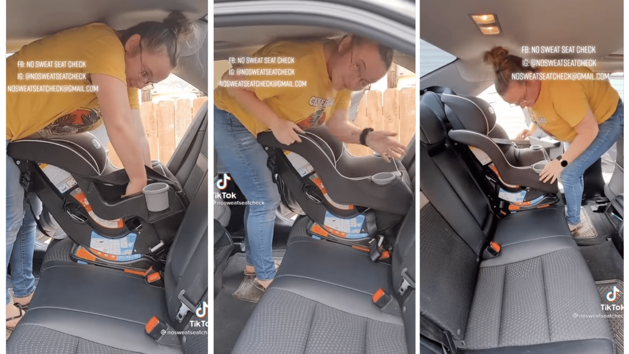 mom showing how to install a car seat