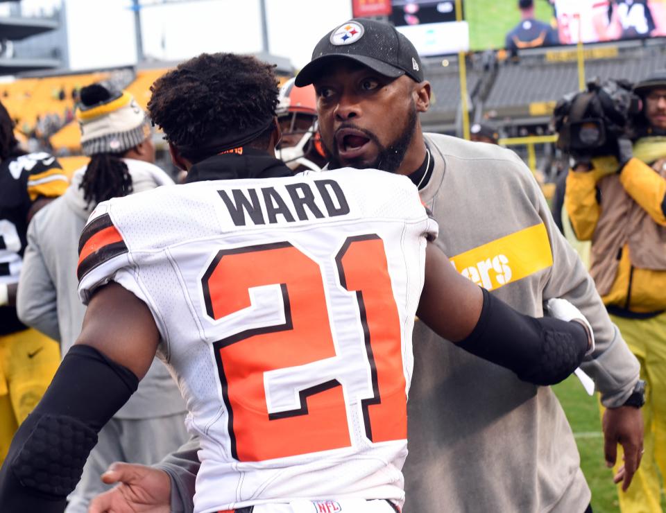 Oct 28, 2018; Pittsburgh, PA, USA; Pittsburgh Steelers head coach Mike Tomlin greets Cleveland Browns defensive back Denzel Ward (21) following their game at Heinz Field. Mandatory Credit: Philip G. Pavely-USA TODAY Sports