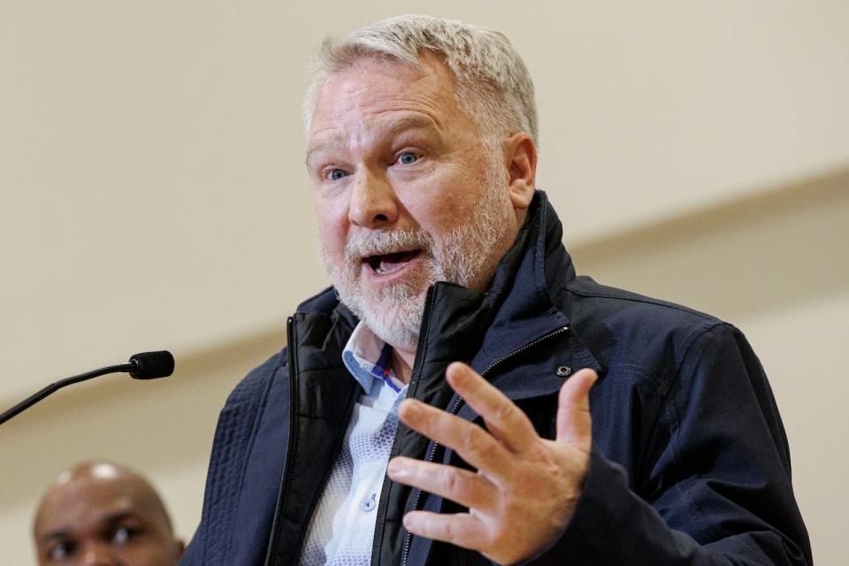 Gordon Tanner, who heads shelter and support services for the City of Toronto, joins Mayor Olivia Chow during a tour of Covenant House on Jan. 15, 2024.