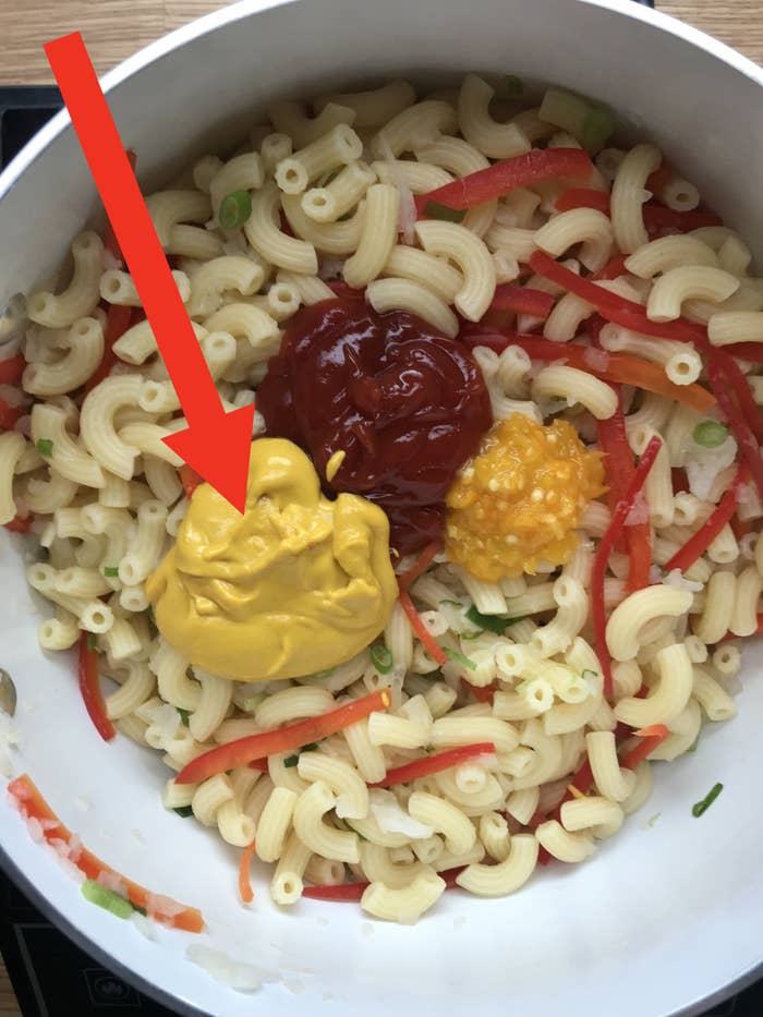 Mac 'n' cheese with ketchup and mustard.