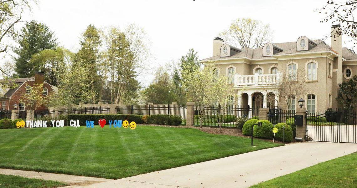 A yard sign thanking University of Kentucky basketball coach John Calipari sits on the front lawn of his Lexington house, April 8, 2024.