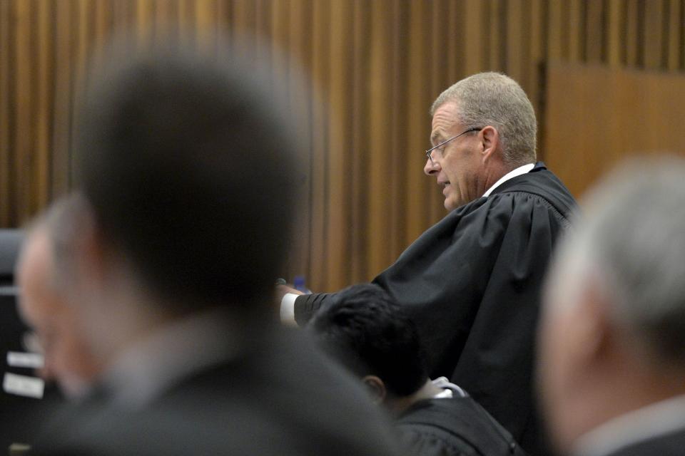 State prosecutor Nel reads out the charge sheet during the trial of Pistorius in Pretoria