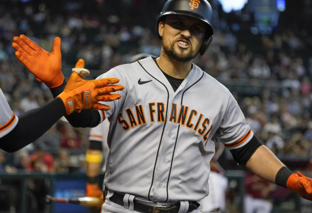 Evan Longoria of the San Francisco Giants hits a base loaded two-run