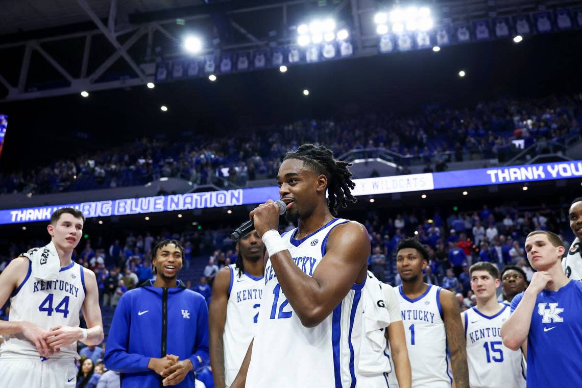 Kentucky guard Antonio Reeves (12) thanks fans after the Wildcats defeated Vanderbilt at Rupp Arena on Wednesday night.