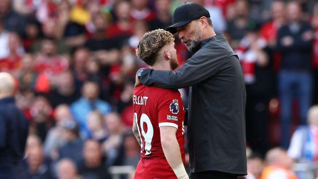 Harvey Elliott embraces Jurgen Klopp