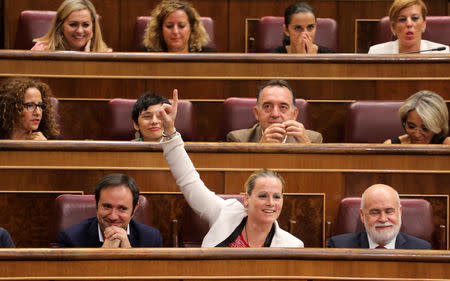 Socialist party (PSOE) deputy Zaida Cantera votes in parliament on the Socialist's government's plans to exhume the remains of former dictator Francisco Franco from the giant mausoleum at "The Valley of the Fallen", in Madrid, Spain, September 13, 2018. REUTERS/Sergio Perez