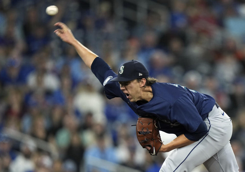 Seattle Mariners pitcher Logan Gilbert works against the Toronto Blue Jays during first inning of a baseball game in Toronto, Wednesday, April 10, 2024. (Nathan Denette/The Canadian Press via AP)