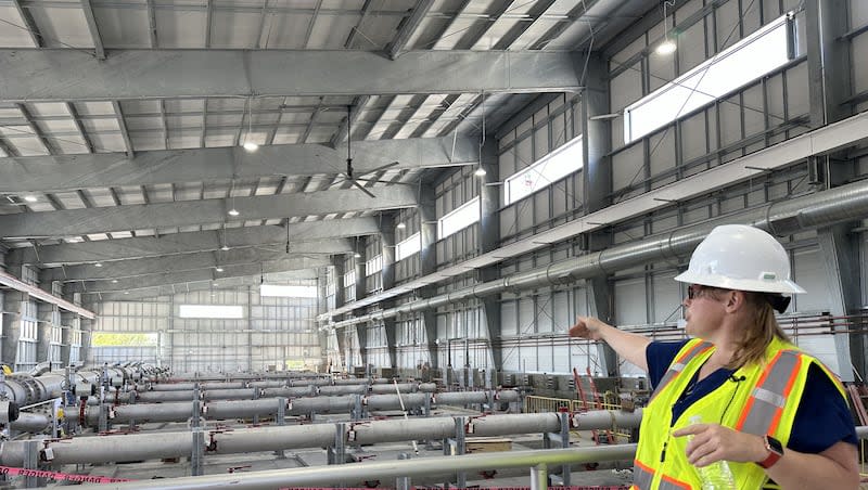 Jenny Calderon, of Waterworks Engineers, gives a tour of a new wastewater treatment plant on Monday in Provo to more efficiently clean sewage water before it goes into Utah Lake.