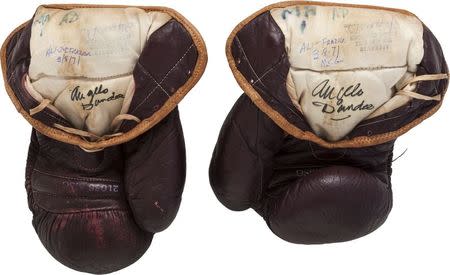 The 1971 Muhammad Ali gloves from his first Joe Frazier bout are pictured in this undated handout photo courtesy of Heritage Auctions received July 31, 2014. REUTERS/Heritage Auctions/Handout via Reuters