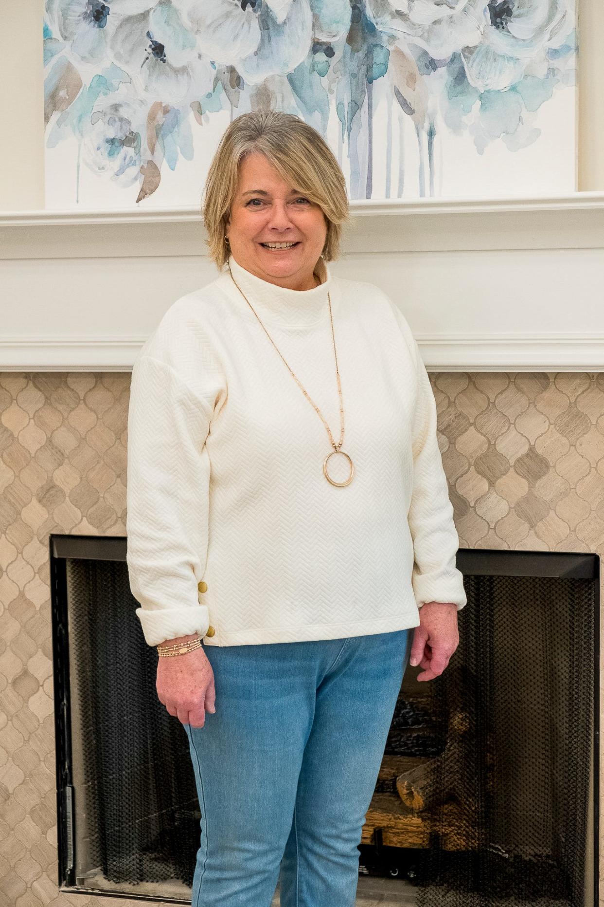 Judy Teal loves  the open floor plan and enclosed patio of her new home.