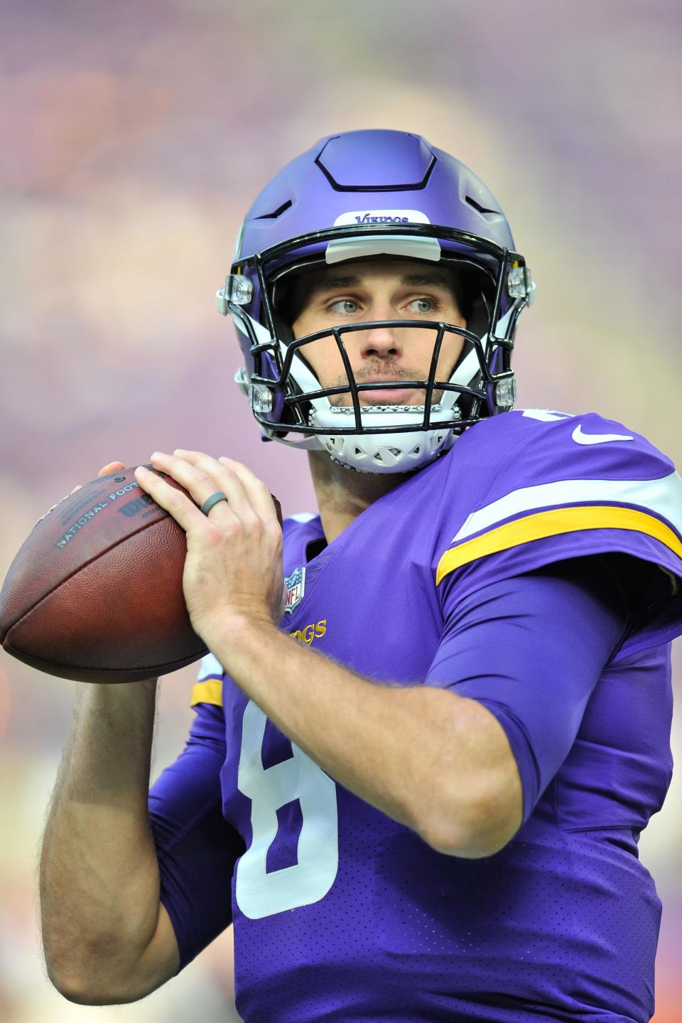 Minnesota Vikings quarterback Kirk Cousins (8) warms up before the game against the Arizona Cardinals at U.S. Bank Stadium in Minneapolis on Oct. 30, 2022.