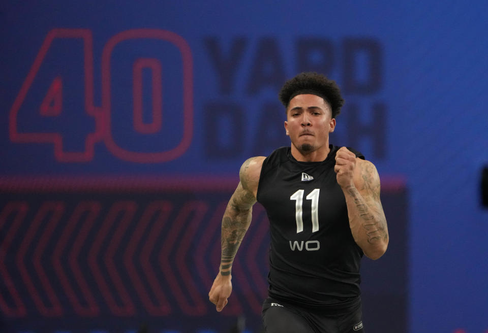 Mar 3, 2022; Indianapolis, IN, USA; Indiana wide receiver Ty Fryfogle (WO11) runs the 40-yard dash during the 2022 NFL Scouting Combine at Lucas Oil Stadium. Mandatory Credit: Kirby Lee-USA TODAY Sports