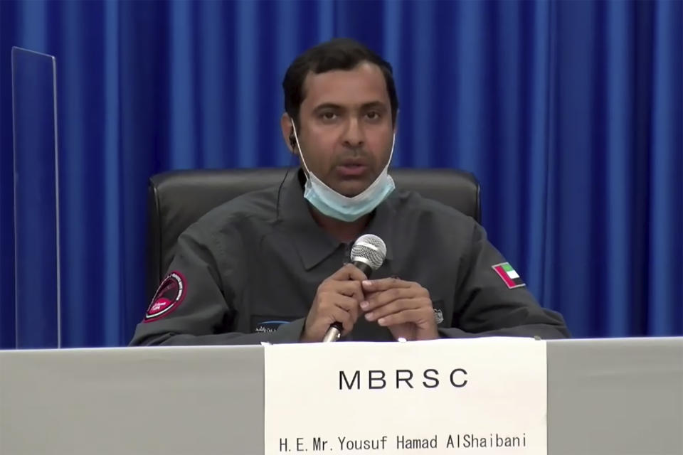 In this image made from a video, Yousuf Hamad AlShaibani of Mohammed bin Rashid Space Center attends a news conference at Tanegashima Space Center on a small southern Japanese island after a launch of a United Arab Emirates spacecraft Monday, July 20, 2020. A United Arab Emirates spacecraft rocketed away Monday on a seven-month journey to Mars, kicking off the Arab world’s first interplanetary mission. (MHI via AP Photo)