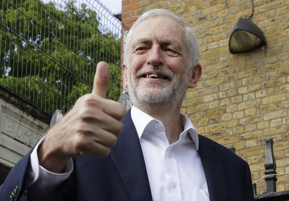 FILE - In this Thursday, May 23, 2019 file photo, Jeremy Corbyn leader of Britain's opposition Labour Party gives the thumbs up after voting in the European Elections in London. In a significant shift, Britain’s main opposition Labour Party said Tuesday July 9, 2019, that Britain’s next prime minister should hold a referendum on whether to leave the European Union or remain in the bloc. (AP Photo/Kirsty Wigglesworth, File)