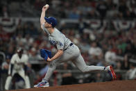 Los Angeles Dodgers pitcher Walker Buehler throws during the first inning in Game 6 of baseball's National League Championship Series against the Atlanta Braves Saturday, Oct. 23, 2021, in Atlanta. (AP Photo/Ashley Landis)