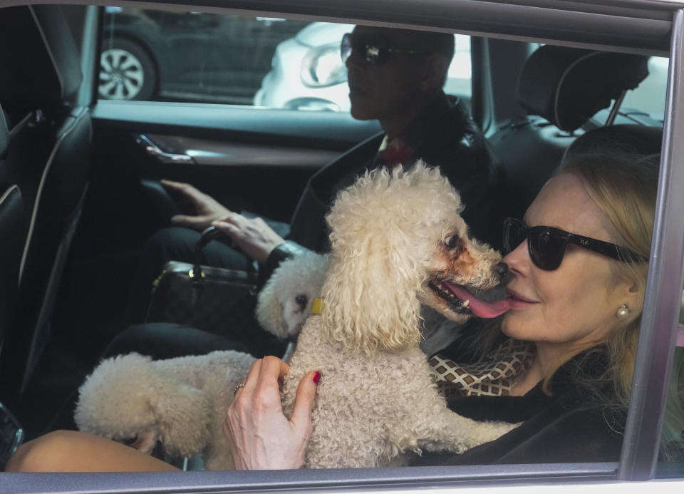 Texas-born Princess Rita Boncompagni Ludovisi, born Rita Jenrette Carpenter and last wife of late Prince Nicolo Boncompagni Ludovisi, leaves her residence, The Casino dell'Aurora, also known as Villa Ludovisi, during the execution of an eviction order, in Rome, Thursday, April 20, 2023. The villa contains the only known ceiling painted by Caravaggio and Princess Ludovisi is facing a court-ordered eviction Thursday, in the latest chapter in an inheritance dispute with the heirs of one of Rome's aristocratic families. (AP Photo/Andrew Medichini)