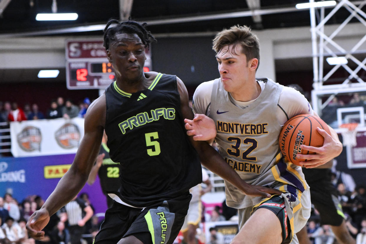 SPRINGFIELD, MA - JANUARY 14: Cooper Flagg of Montverde Academy (32) drives to the basket while being defended by Vazoumana Diallo of Prolific Prep (5) during the first half of the Spalding Hoophall Classic high school basketball game between Montverde Academy and Prolific Prep on January 14, 2024 at Blake Arena in Springfield, MA (Photo by John Jones/Icon Sportswire via Getty Images)