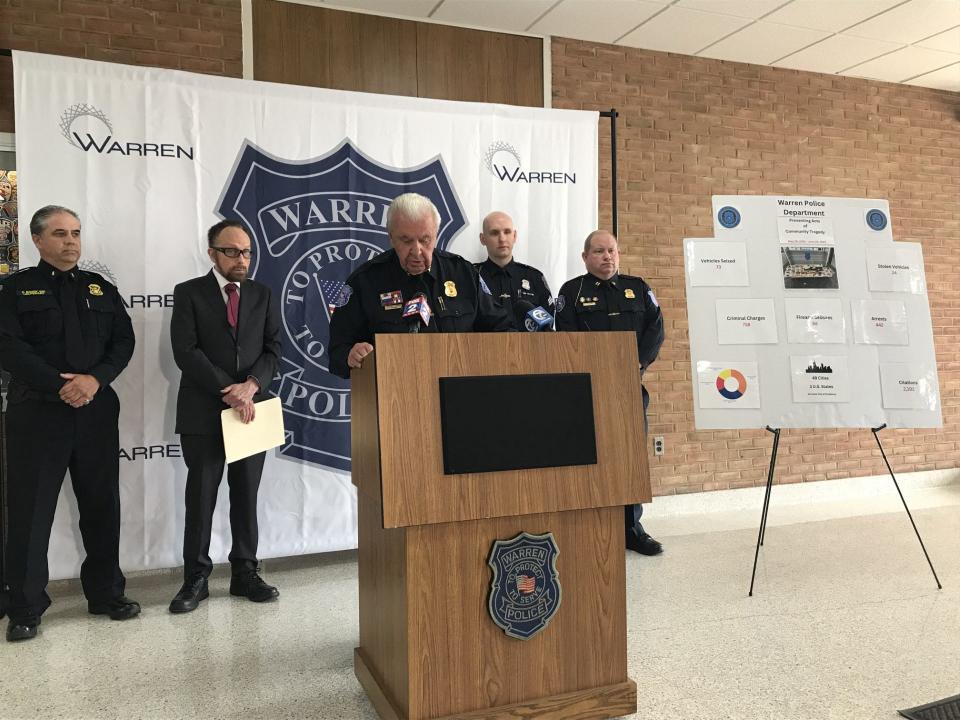 Warren Police Commissioner William Dwyer, center, speaks at Warren Police headquarters during a June 28, 2023 press conference about a monthlong law enforcement sweep in the city.