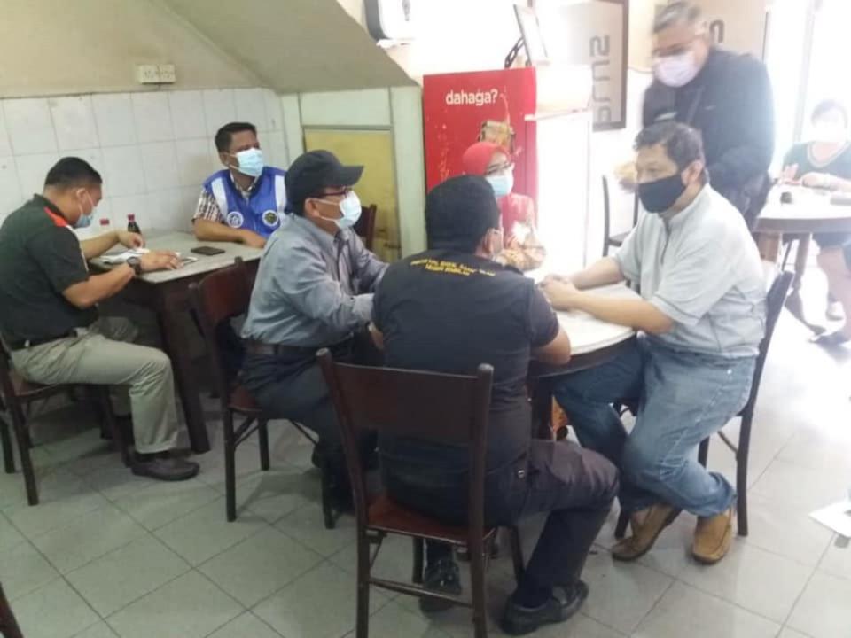 JHEAINS officers during a spot-check on a popular kopitiam in Kuala Pilah January 8, 2021. — Picture via Facebook/ Jabatan Hal Ehwal Agama Islam Negeri Sembilan ‘Official’