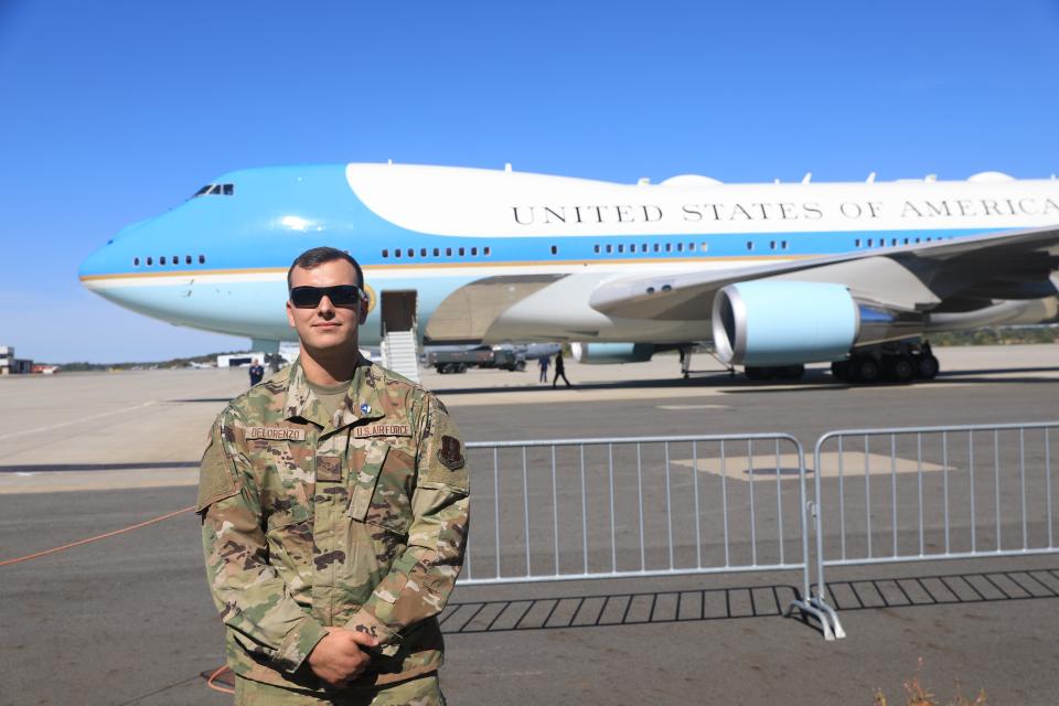 Airman first class Matthew DeLorenzo poses in front of Air Force One at Stewart Air National Guard Base in Newburgh on October 6, 2022. DeLorenzo is a crew chief for the runway at Stewart and he chocked Air Force One before President Biden deplaned. 