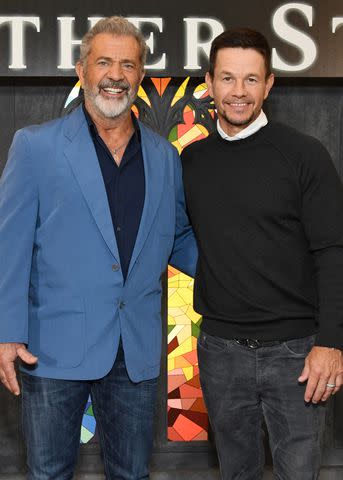 <p>Jon Kopaloff/Getty</p> Mel Gibson and Mark Wahlberg