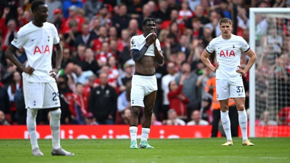 Tottenham players look dejected after conceding against Liverpool