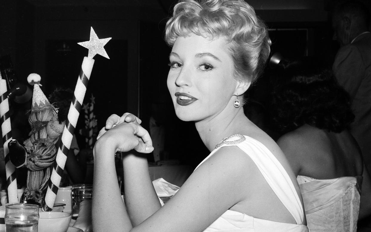 Venetia Stevenson attends the Makeup Artist Ball in Los Angeles, 1956 - Earl Leaf/Michael Ochs Archives/Getty 