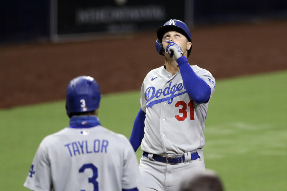 Los Angeles Dodgers' Joc Pederson reacts after hitting a three-run home run during the sixth inning of a baseball game against the San Diego Padres, Wednesday, Aug. 5, 2020, in San Diego. (AP Photo/Gregory Bull)