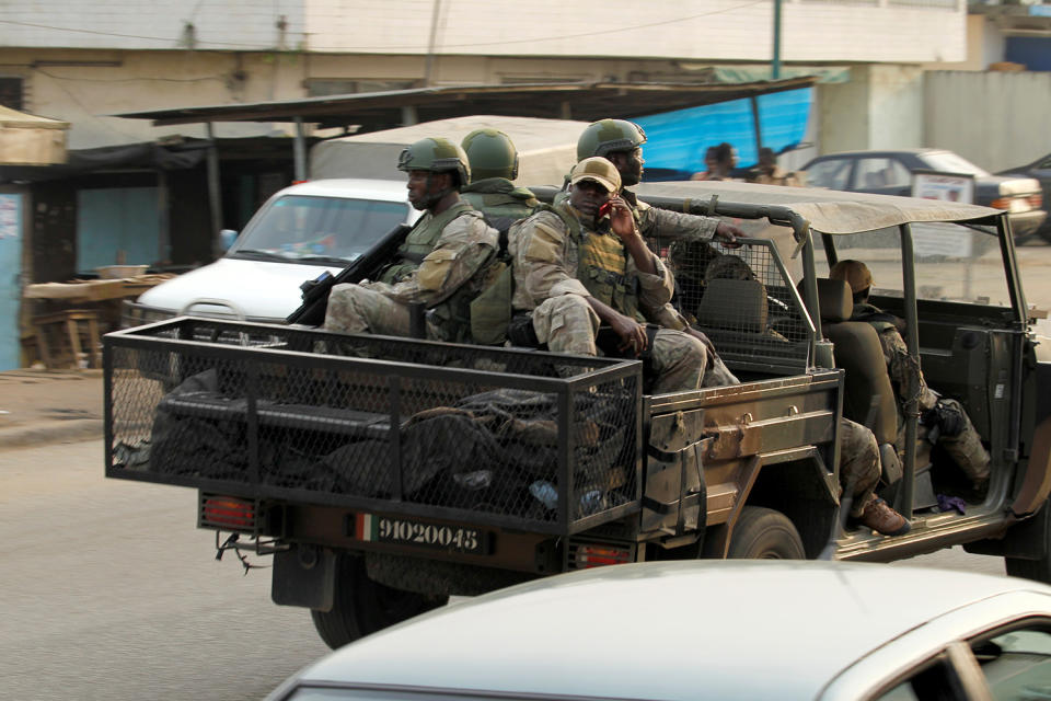 Ivory Coast special forces drive through Adiake