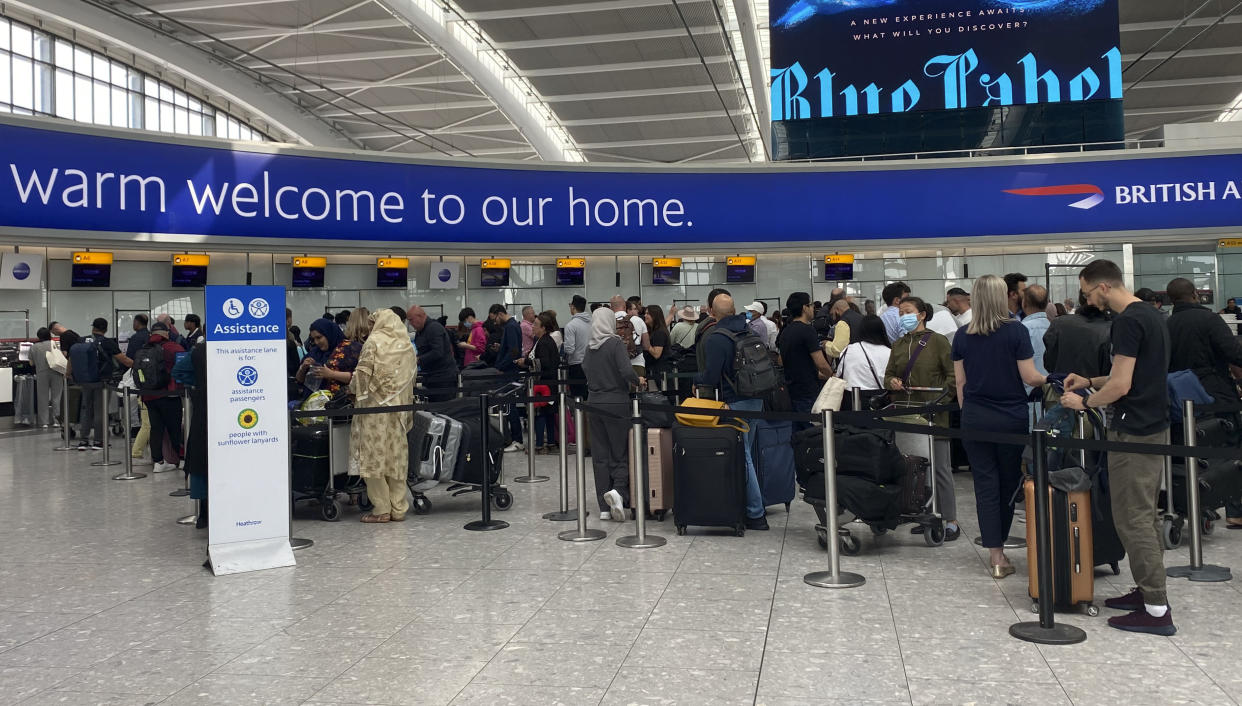 Passengers queue to check-in for a Qatar Airways flight in Terminal 5 at Heathrow Airport as the Transport Secretary is risking travel chaos by rejecting calls for an emergency visa for aviation workers, industry bosses have claimed. Picture date: Friday June 3, 2022.