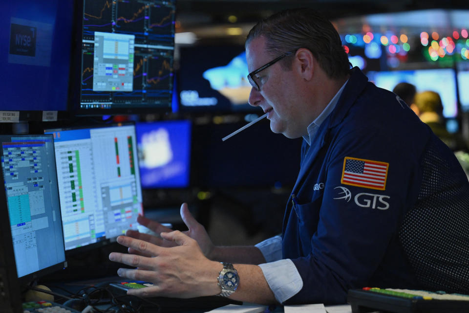 Traders work on the floor of the New York Stock Exchange (NYSE) during morning trading on December 14, 2023, in New York City. (Photo by ANGELA WEISS / AFP) (Photo by ANGELA WEISS/AFP via Getty Images)