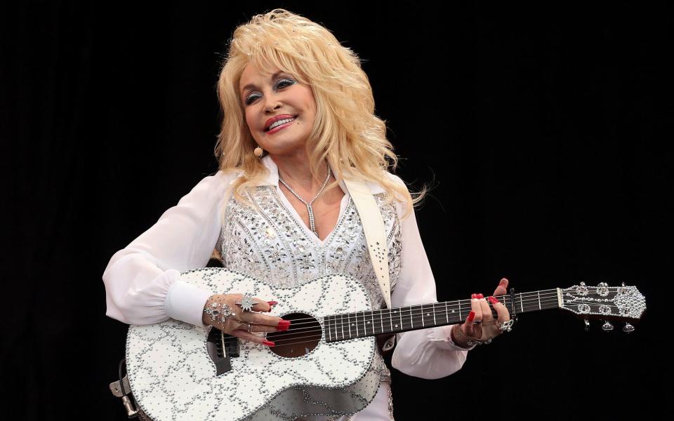 Dolly Parton performing (at last) on the Pyramid Stage in 2014 - CATHAL MCNAUGHTON/Reuters