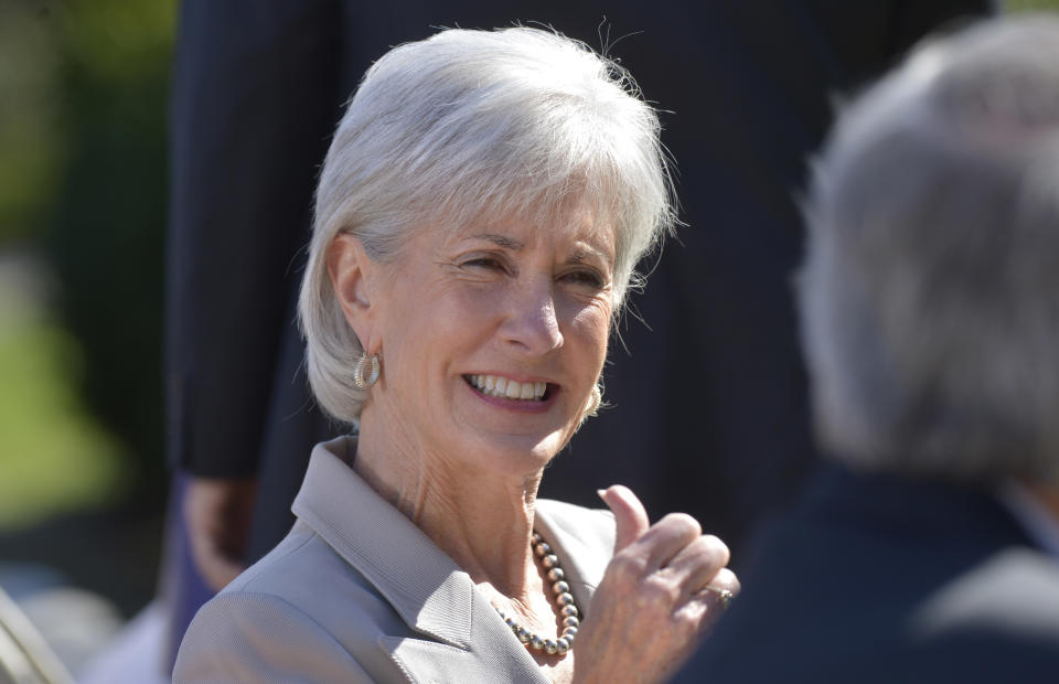 Health and Human Services Secretary Kathleen Sebelius sits in the audience as she waits for President Barack Obama to make a statement on the Affordable Care Act, Tuesday, April 1, 2014, in the Rose Garden of the White House in Washington. (AP Photo/Susan Walsh)