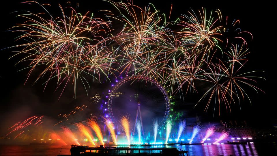 Fireworks explode over the London Eye Ferris wheel on January 1, 2023. - Maja Smiejkowska/Reuters