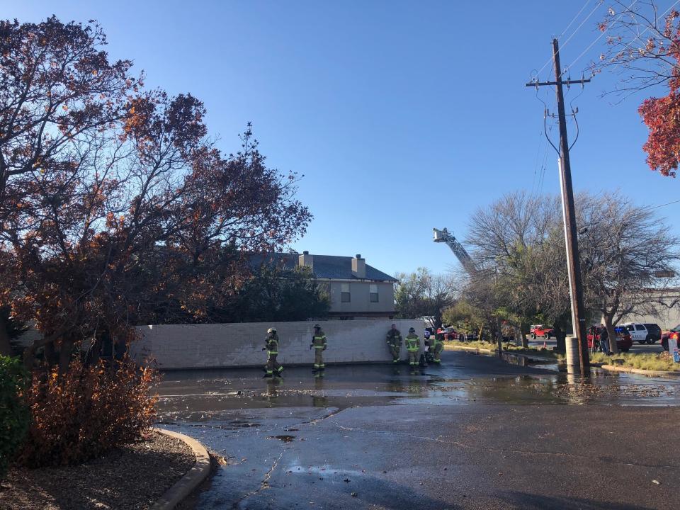 Lubbock Fire Rescue crews remained at the scene of a fire at the Branchwater Apartments just before 4 p.m. Friday near 4th Street and West Loop 289.