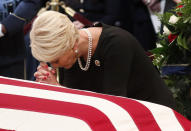 <p>Cindy McCain pauses at the casket of her husband Sen. John McCain, R-Ariz., during a ceremony as McCain lies in state at the Rotunda of the U.S. Capitol in Washington, Friday, Aug. 31, 2018. (Photo: Kevin Lamarque/Pool Photo via AP) </p>