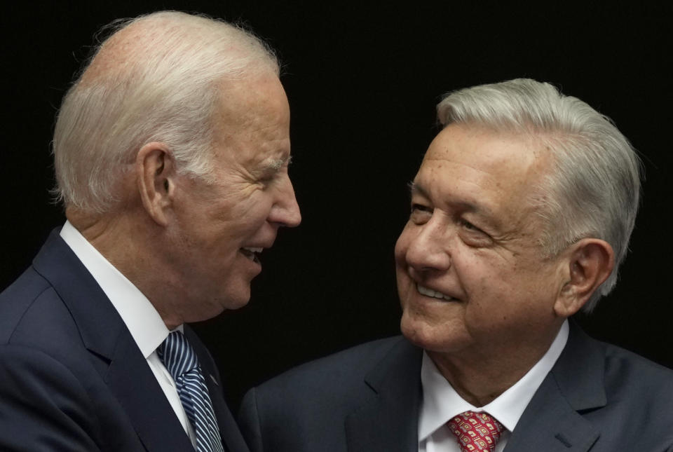 FILE - Mexican President Andres Manuel Lopez Obrador, right, and U.S. President Joe Biden shake hands at the National Palace in Mexico City, Jan. 9, 2023. Mexico’s president said on May 8, 2023 that he will talk with Biden by telephone on May 9 about immigration and the fentanyl crisis. (AP Photo/Fernando Llano, File)