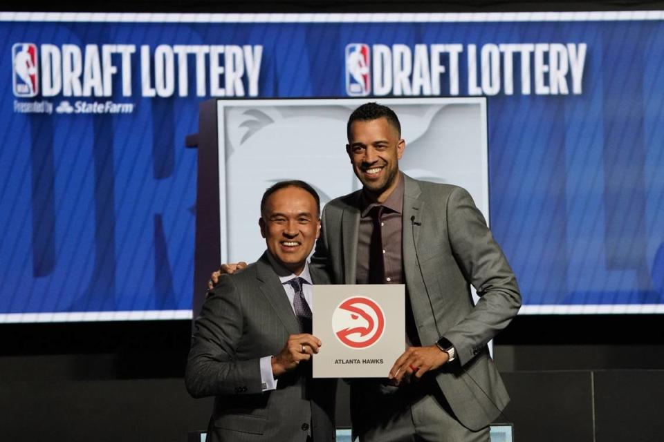 Atlanta Hawks general manager Landry Fields (right) and Mark Tatum Deputy commissioner of the NBA after the Hawks get the number one pick in the 2024 NBA Draft Lottery at McCormick Place West.