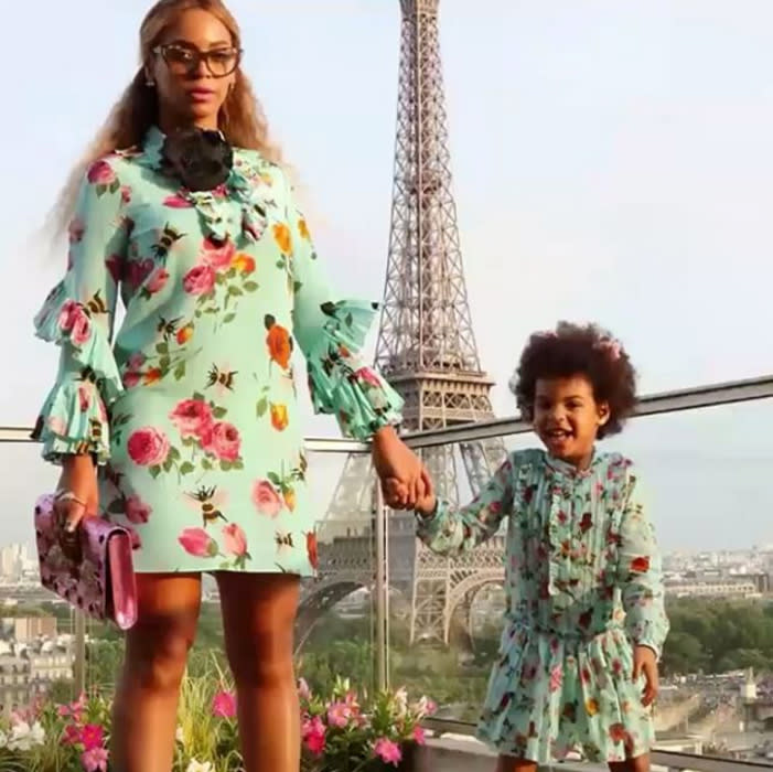 <p>During the European leg of Beyoncé's <em>Formation</em> tour, Blue Ivy and her mom strike a series of poses in matching <a rel="nofollow noopener" href="http://click.linksynergy.com/fs-bin/click?id=93xLBvPhAeE&subid=0&offerid=254156.1&type=10&tmpid=6893&RD_PARM1=https%3A%2F%2Fwww.net-a-porter.com%2Fus%2Fen%2FShop%2FDesigners%2FGucci%3Fpn%3D1%2526npp%3D60%2526image_view%3Dproduct%2526dScroll%3D0&u1=ISHABEYPARIS" target="_blank" data-ylk="slk:Gucci dresses;elm:context_link;itc:0" class="link ">Gucci dresses</a> in front of the Eiffel Tower, holding hands, jumping in the air, and blowing kisses.</p>