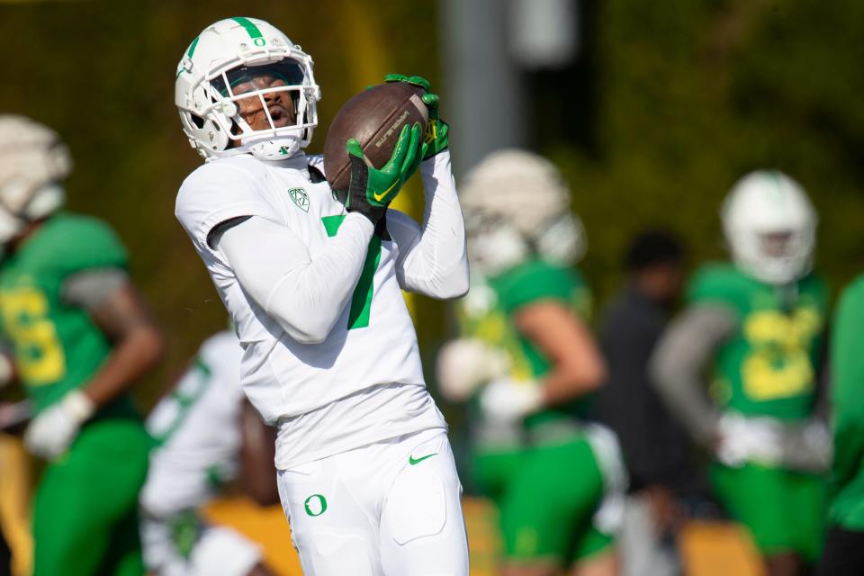 Oregon wide receiver Evan Stewart makes a catch during practice with the Ducks April 23 at the Hatfield-Dowlin Complex in Eugene.