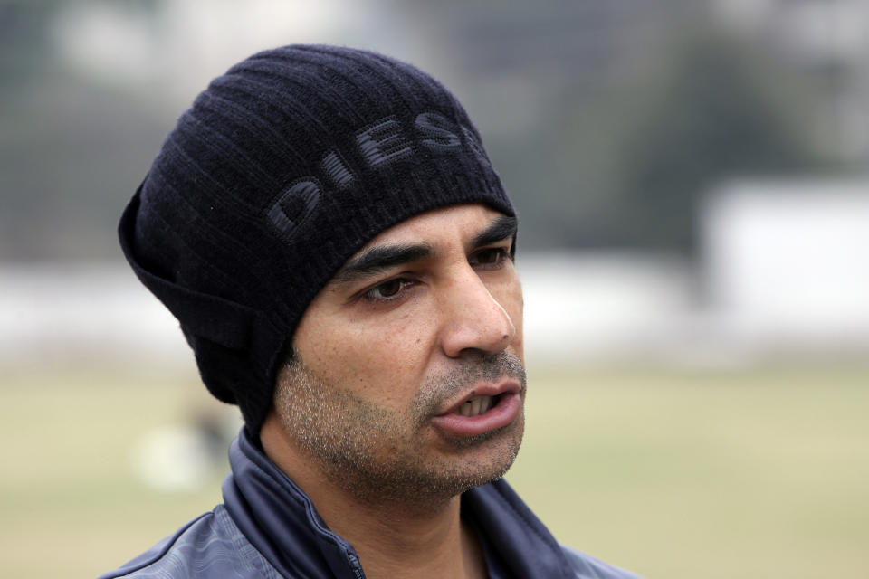 Pakistani Test cricketer Salman Butt talks with reporters in Lahore, Pakistan, Wednesday, Feb. 20, 2019. Butt hopes to make a comeback into the national team after the left-handed opening batsman replaced injured Mohammad Hafeez in the Pakistan Super League. (AP Photo/K.M. Chaudary)