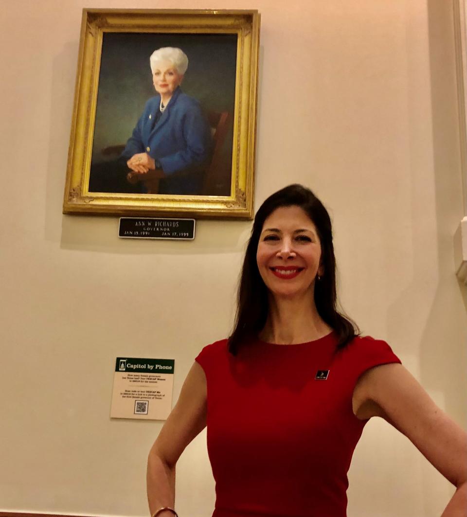 Actress-screenwriter Mykle McCoslin is developing a TV series about a female governor of Texas. She is posing before the portrait of former Gov. Ann Richards in the Texas Capitol Rotunda, March 30, 2023.