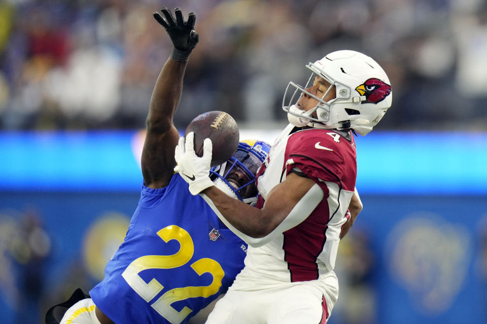 Arizona Cardinals wide receiver Rondale Moore (4) makes a one-handed catch in front of Los Angeles Rams cornerback David Long Jr. (22) during the second half of an NFL football game Sunday, Nov. 13, 2022, in Inglewood, Calif. (AP Photo/Jae C. Hong)